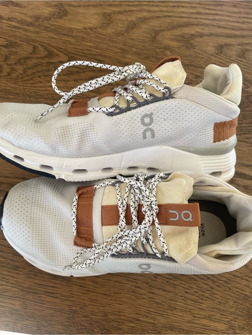 On Running White and Tan Lace-Up Sneakers